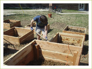 In goes the soil and organics. Almost ready for planting day.